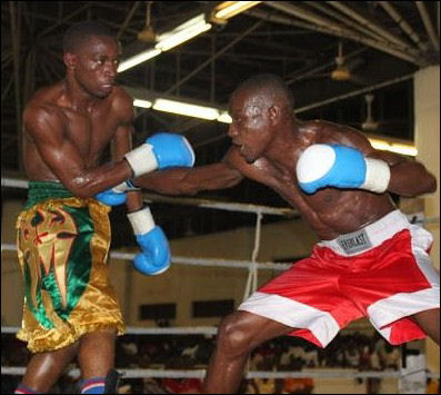 UBO Inter-Continental Bantamweight Champion Francis Miyeyusho lands to the body of challenger Nasibu Ramadhan.