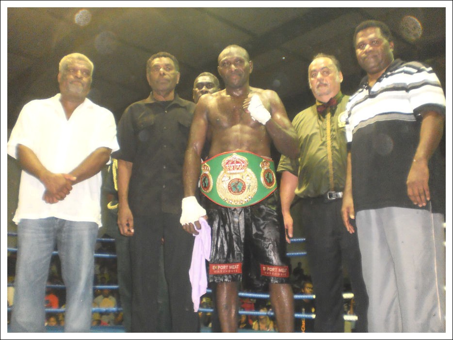 From Left to Right: Mr. Morgens Stevens (Vanuatu Minister of Sports), Mr. Iolu Abil (President of Vanuatu Republic), Kali Jacobus, (behind Jacobus is trainer Mr. Aphal Malon), Reginald Leca, Mr. Wesley Rasu (Promoter).